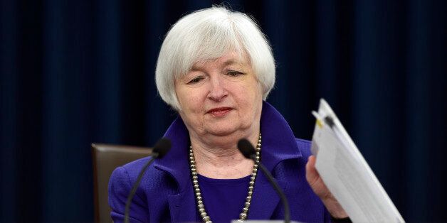 Federal Reserve Chair Janet Yellen closes her notebook after holding a news conference in Washington, Wednesday, Dec. 16, 2015, following an announcement that the Federal Reserve raised its key interest rate by quarter-point, heralding higher lending rates in an economy much sturdier than the one the Fed helped rescue in 2008. (AP Photo/Susan Walsh)