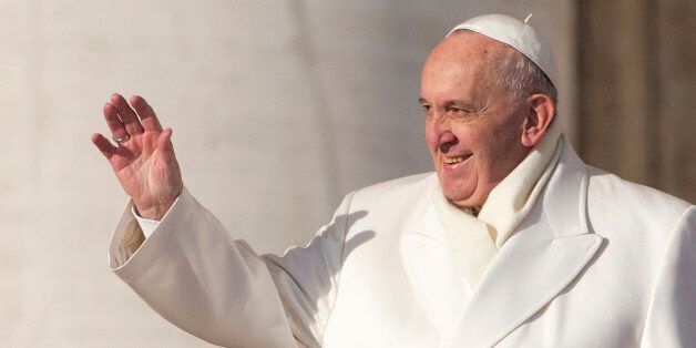 Pope Francis waves as he arrives to hold his weekly general audience, in St. Peter's Square, at the Vatican,  Wednesday, Dec. 30, 2015. (AP Photo/Andrew Medichini)