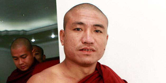 FILE - In this Monday, Jan. 16, 2012 file photo, Shin Gambira, a prominent Buddhist monk who was one of hundreds of political prisoners freed in Myanmar, attends a ceremony of