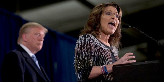 Former Alaska Gov. Sarah Palin, right, endorses  Republican presidential candidate Donald Trump during a rally at the Iowa State University, Tuesday, Jan. 19, 2016, in Ames, Iowa. (AP Photo/Mary Altaffer)