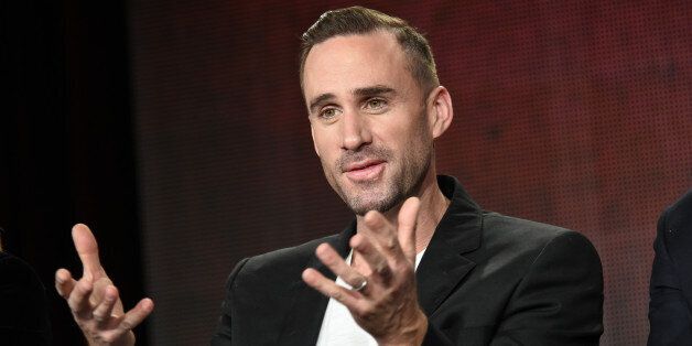 Joseph Fiennes speaks on stage during the