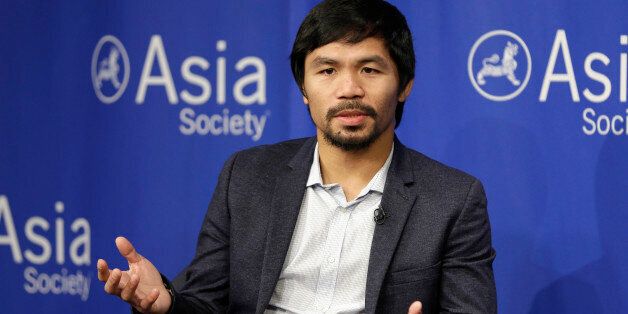 FILE - In this Oct. 12, 2015, file photo, Manny Pacquiao takes questions at the Asia Society in New York. Boxing star Pacquiao has created a firestorm in his home country after saying people in same-sex relationships âare worse than animals.â Pacquiao, who is running for a Philippine Senate seat, made the remark in a video posted Monday, Feb. 15, 2016, on local TV5âs election site. He also said animals are better than people in same-sex relationships because they recognize the dif
