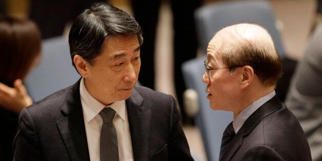 Chinese ambassador to the United Nations Liu Jieyi, right, talks with South Korean ambassador to the U.N. Oh Joon before a Security Council meeting at United Nations headquarters, Wednesday, March 2, 2016. The U.N. Security Council voted Wednesday on a resolution that would impose the toughest sanctions on North Korea in two decades. (AP Photo/Seth Wenig)