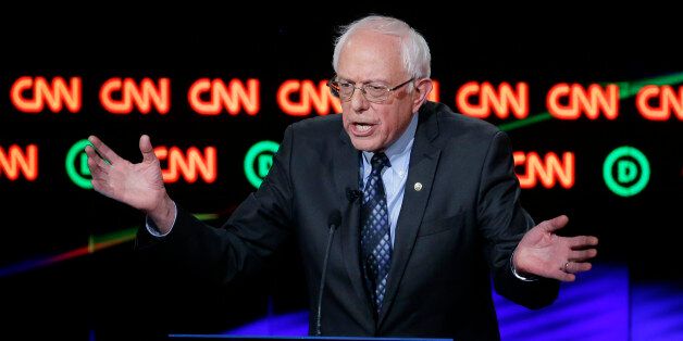 Democratic presidential candidate, Sen. Bernie Sanders, I-Vt., argues a point during a Democratic presidential primary debate at the University of Michigan-Flint, Sunday, March 6, 2016, in Flint, Mich. (AP Photo/Carlos Osorio)