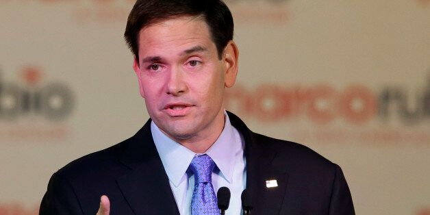 Florida Sen. Marco Rubio gestures as he announces that he is running for the Republican presidential nomination during a rally at the Freedom Tower, Monday, April 13, 2015, in Miami. (AP Photo/Wilfredo Lee)
