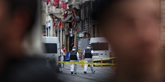 ISTANBUL, TURKEY - MARCH 19:  Police secure the area as forensics inspects the blast site following a suicide bombing in a major shopping and tourist district in the central part of the city on March 19, 2016 in Istanbul, Turkey. The explosion on Istanbul's main pedestrian shopping Istiklal street today killed at least four people and left many injured. (Photo by Burak Kara/Getty Images)