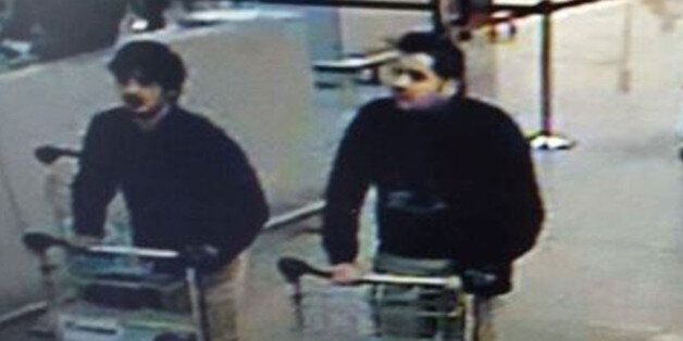 In this image provided by the Belgian Federal Police in Brussels on Tuesday, March 22, 2016 of three men who are suspected of taking part in the attacks at Belgium's Zaventem Airport. The man at right is still being sought by the police and two others in the photo that the police issued were according to a the Belgian Prosecutors 'probably' suicide bombers. Bombs exploded at the Brussels airport and one of the city's metro stations Tuesday, killing and wounding scores of people, as a European ca