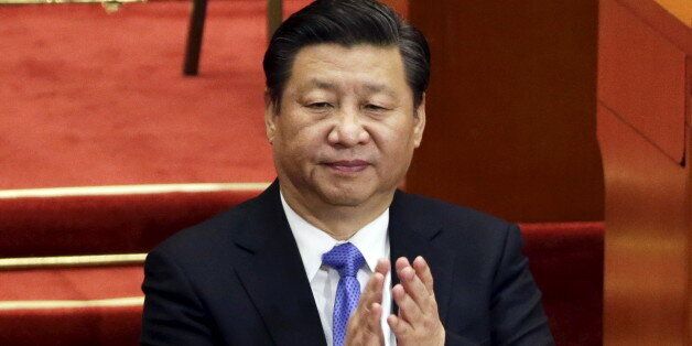 China's President Xi Jinping claps during the closing ceremony of the Chinese People's Political Consultative Conference (CPPCC) at the Great Hall of the People, in Beijing, China, March 14, 2016. REUTERS/Jason Lee