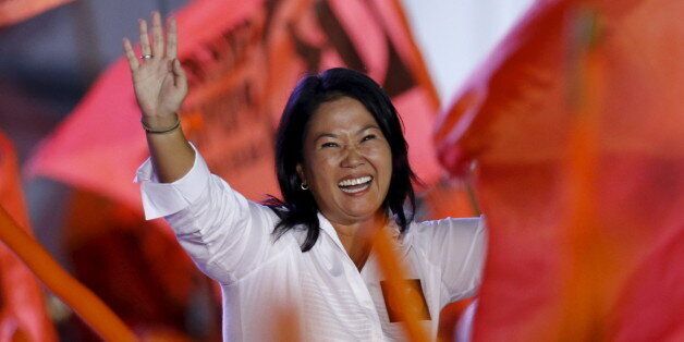 Peru's presidential candidate Keiko Fujimori of 'Fuerza Popular' party waves to supporters during her closing campaign meeting in Lima, Peru, April 7, 2016. REUTERS/Mariana Bazo