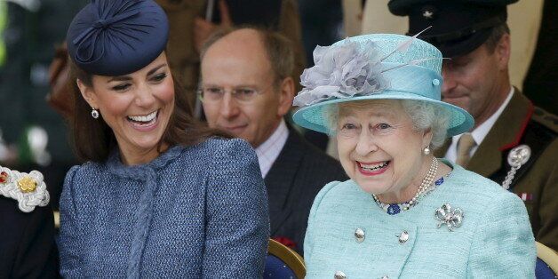Catherine, Duchess of Cambridge (L) laughs as Queen Elizabeth gestures while they watch a children's sports event in Nottingham, Britain in this June 13, 2012 file photo. Queen Elizabeth celebrates her 90th birthday on April 21, 2016.    REUTERS/Phil Noble/Files   SEARCH 'Queen 90th