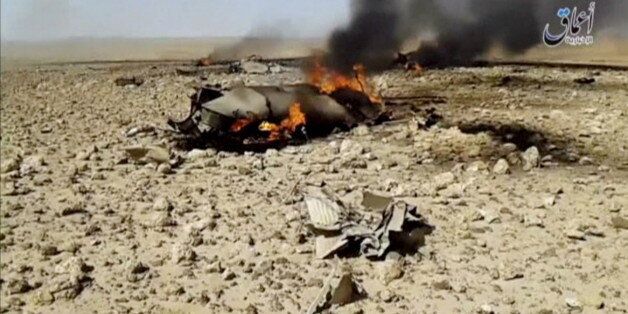 A view of the burning wreckage of a plane that crashed southeast of Damascus, Syria in this still image taken from video said to be shot April 22, 2016. The video was shared online by Islamic State-affiliated news agency Amaq. Reuters could not independently verify the video.    Social Media Website via Reuters TV  ATTENTION EDITORS - THIS IMAGE WAS PROVIDED BY A THIRD PARTY. EDITORIAL USE ONLY. NO RESALES. NO ARCHIVE.