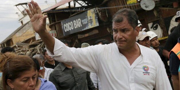 Ecuador's President Rafael Correa (R) greets residents during his visit after an earthquake struck off the Pacific coast, in town of Canoa, Ecuador, April 18, 2016. REUTERS/Henry Romero