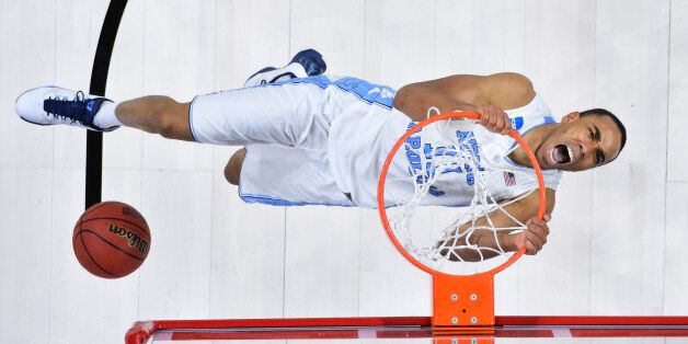 Mar 19, 2016; Raleigh, NC, USA; North Carolina Tar Heels forward Brice Johnson (11) dunks the ball against the Providence Friars during the second round of the 2016 NCAA Tournament at PNC Arena. The Tar Heels won 85-66. Mandatory Credit: Bob Donnan-USA TODAY Sports