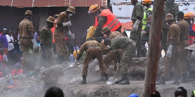Rescue workers remove debris from the rubble of the six-storey building that collapsed killing 23 people in Nairobi's suburb of Huruma, on May 3, 2016.Kenyan rescuers pulled an 18-month-old toddler alive from the rubble of a six-storey building on May 3, four days after the block collapsed killing 23 people, police said. Located in the poor, tightly-packed Huruma neighbourhood, the building had been slated for demolition after being declared structurally unsound. But an evacuation order for the