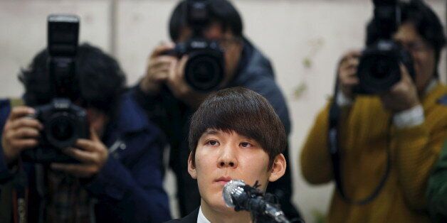 South Korea's Olympic swimming champion Park Tae-hwan attends a news conference at a hotel in Seoul March 27, 2015. Park Tae-hwan choked back the tears on Friday as he apologised for a failed doping test that led to an 18-month ban from the sport and said he wished he could turn back time and do things differently. REUTERS/Kim Hong-Ji