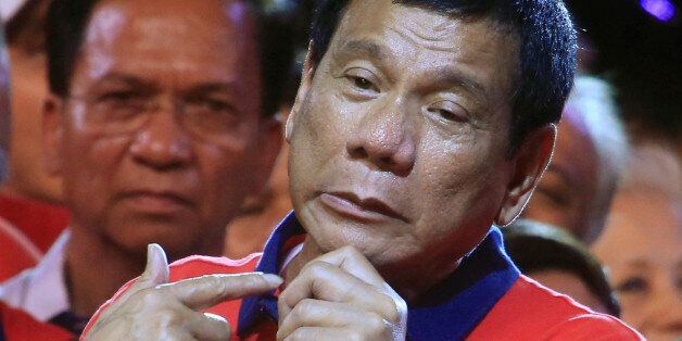 Philippine presidential candidate and Davao city mayor Rodrigo 'Digong' Duterte gestures during a
