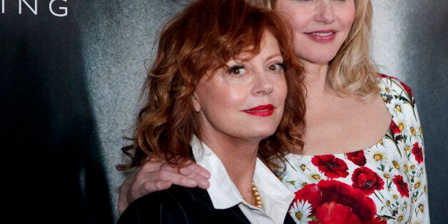 Actresses Susan Sarandon, left, and Geena Davis pose for photographers during a photo call for the Women In Motion Talks at the 69th international film festival, Cannes, southern France, Sunday, May 15, 2016. (AP Photo/Thibault Camus)