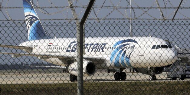 A hijacked Egyptair Airbus A320 airbus stands on the runway at Larnaca Airport in Larnaca, Cyprus , March 29, 2016.      REUTERS/Yiannis Kourtoglou      TPX IMAGES OF THE DAY