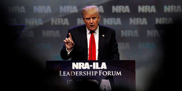 Republican presidential candidate Donald Trump addresses members of the National Rifle Association's during their NRA-ILA Leadership Forum during their annual meeting in Louisville, Kentucky, U.S., May 20, 2016. REUTERS/John Sommers II