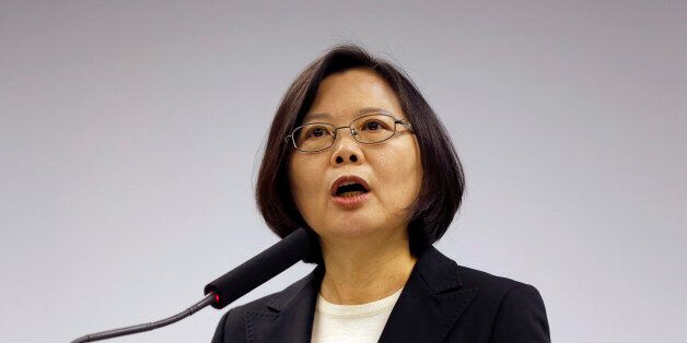 Taiwan's President-elect Tsai Ing-wen, announces that Lin Chuan is her choice for premier at their Democratic Progressive Party headquarters in Taipei, Taiwan, Tuesday, March 15, 2016. Tsai on Tuesday named former finance minister Lin as Taiwanâs next premier, tasked with reinvigorating the islandâs slowing high-tech economy and stabilizing relations with neighbor China, which claims Taiwan as its own territory. Lin and Tsai will take office on May 20. (AP Photo/Wally Santana)