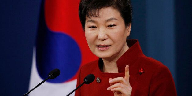 South Korean President Park Geun-hye answers to a reporter's question during her news conference at the Presidential Blue House in Seoul, South Korea, Wednesday, Jan. 13, 2016. Park on Wednesday urged North Korea's only major ally, China, to help punish Pyongyang's recent nuclear test with the strongest possible international sanctions. (Kim Hong-ji/Pool Photo via AP)