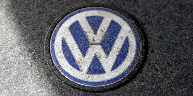 A Volkswagen (VW) logo is seen on a car engine at a scrapyard in Fuerstenfeldbruck, Germany, May 21, 2016.    REUTERS/Michaela Rehle