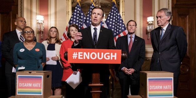Sen. Chris Murphy, D-Conn., center, and other Democratic senators call for gun control legislation in the wake of the mass shooting in an Orlando LGBT nightclub this week, at the Capitol in Washington, Thursday, June 16, 2016. He is joined by, from left, Sen. Cory Booker, D-N.J., Rev. Sharon Risher, a clinical trauma chaplain in Dallas who lost her mother Ethel Lance in the racially-motivated shooting at the historic Emanuel AME Church in Charleston, N.C., in 2015, Tina Meins, whose father Damia