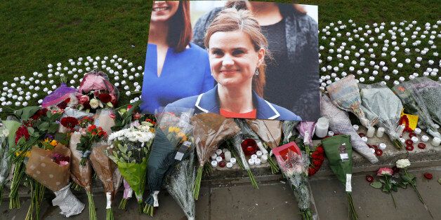 Tributes for Labour Party MP Jo Cox, who was shot dead in the street in northern England, are displayed on Parliament Square in London, Britain, June 16, 2016. REUTERS/Neil Hall FOR EDITORIAL USE ONLY. NO RESALES. NO ARCHIVES.