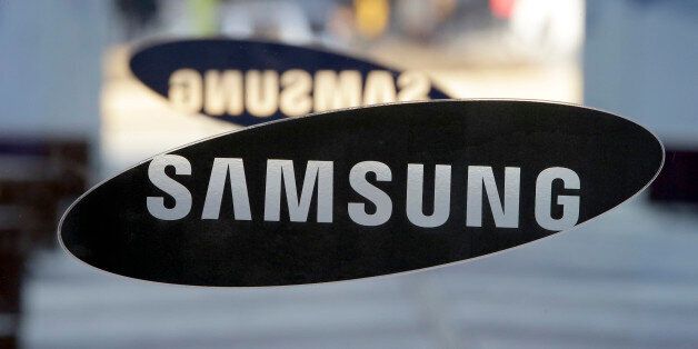 FILE-In this Jan. 8, 2015, file photo, a logo of Samsung Electronics is seen at its showroom in Seoul, South Korea. Samsung Electronics said Thursday, June 16, 2016, that it has agreed to buy a U.S. cloud service startup Joyent Inc. as it seeks to boost software and internet services. (AP Photo/Lee Jin-man. File)