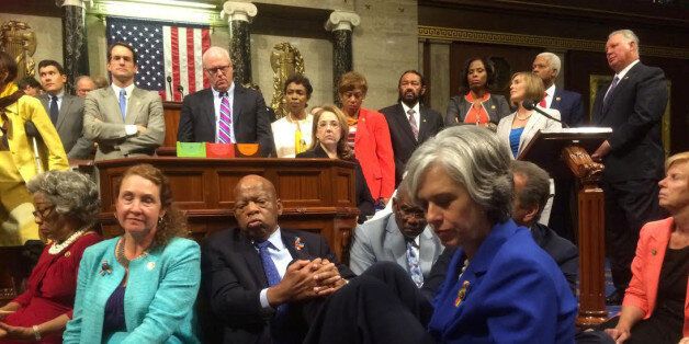 A photo shot and tweeted from the floor of the U.S. House of Representatives by U.S. House Rep. Katherine Clark shows Democratic members of the House staging a sit-in on the House floor