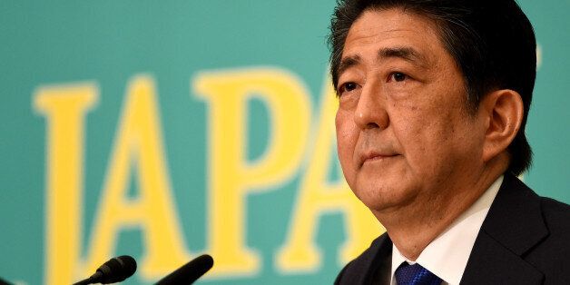 Japanese Prime Minister and ruling Liberal Democratic Party leader Shinzo Abe listens to a question during a debate with eight other party leaders at the Japan National Press Club in Tokyo on June 21, 2016.Japan holds upper house parliamentary elections in July and Abe's time in office ends in September 2018, unless his party approves an exceptional measure to extend his leadership. / AFP / TOSHIFUMI KITAMURA        (Photo credit should read TOSHIFUMI KITAMURA/AFP/Getty Images)