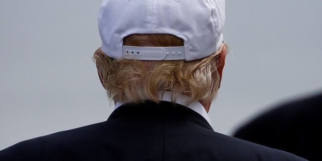 Republican presidential candidate Donald Trump speaks to the media on the golf course at his Trump International Golf Links in Aberdeen, Scotland, June 25, 2016.  REUTERS/Carlo Allegri