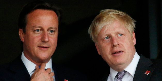 FILE - This is a Friday, July 27, 2012   file photo of Britain's Prime Minister David Cameron, left, and the then  Mayor of London  Boris Johnson as they wait for the start of the Opening Ceremony at the 2012 Summer Olympics, Friday, July 27, 2012, in London. Cameron announced Friday June 24 2016 that he plans to resign following the result of Britain's EU referendum. Cameron said he would stay on for as long as was necessary for stability's sake, but that he could not be the one to lead Britain