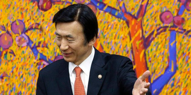 Chinese chief nuclear envoy Wu Dawei, left, is welcomed by South Korean Foreign Minister Yoon Byung-se at Foreign Ministry in Seoul, South Korea, Monday, Feb. 29, 2016. (Kim Hong-Ji/Pool Photo via AP)