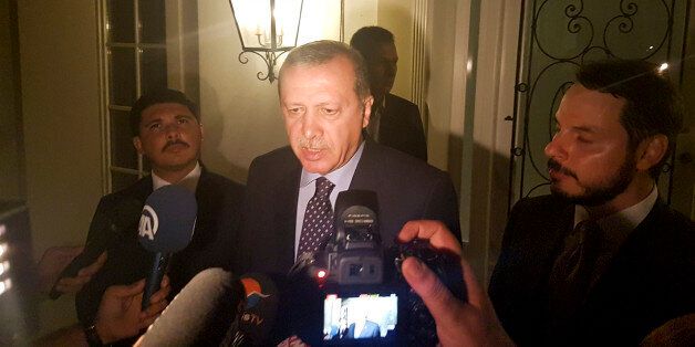 Turkish President Tayyip Erdogan speaks to media in the resort town of Marmaris, Turkey, July 15, 2016.    REUTERS/Kenan Gurbuz