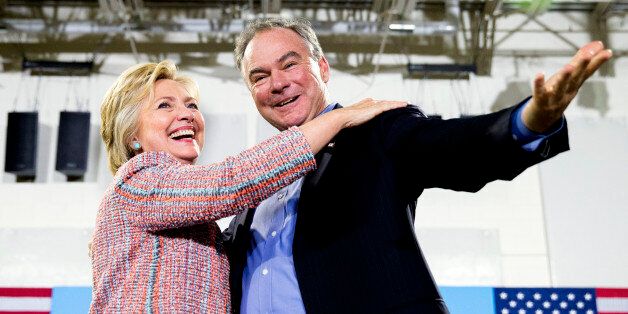 In this July 14, 2016, file photo, Democratic presidential candidate Hillary Clinton, accompanied by Sen. Tim Kaine, D-Va., speaks at a rally at Northern Virginia Community College in Annandale, Va. Clinton has chosen Kaine to be her running mate (AP Photo/Andrew Harnik)