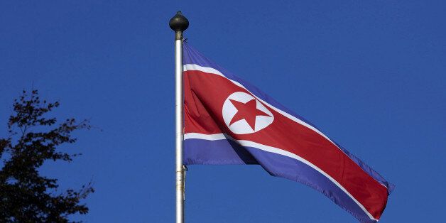 A North Korean flag flies on a mast at the Permanent Mission of North Korea in Geneva October 2, 2014.   REUTERS/Denis Balibouse/File Photo     TPX IMAGES OF THE DAY