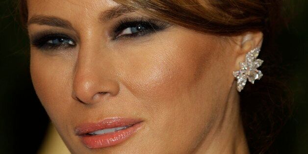 Melania Trump arrives at the Vanity Fair Oscar Party at the Sunset Tower in Los Angeles, Calif., Sunday, Feb. 27, 2011. (AP Photo/Carlo Allegri)