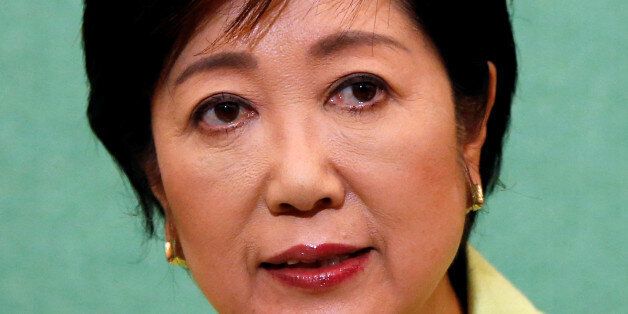 Former defense minister Yuriko Koike, a candidate planning to run in the Tokyo Governor election, attends a joint news conference with other potential candidates at the Japan National Press Club in Tokyo, Japan July 13, 2016.  REUTERS/Issei Kato