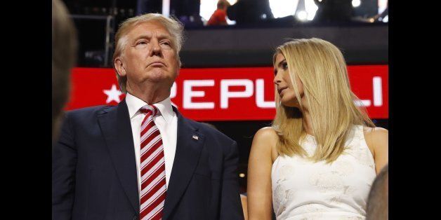 Republican U.S. presidential nominee Donald Trump stands in the Trump family box with his daughter Ivanka (R), awaiting the arrival onstage of his son Eric at the conclusion of former rival candidate Senator Ted Cruz's address, during the third night at the Republican National Convention in Cleveland, Ohio, U.S. July 20, 2016. REUTERS/Aaron P. Bernstein