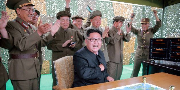 North Korean leader Kim Jong un reacts during a test launch of ground-to-ground medium long-range ballistic rocket Hwasong-10 in this undated photo released by North Korea's Korean Central News Agency (KCNA) on June 23, 2016.  REUTERS/KCNA      TPX IMAGES OF THE DAY       ATTENTION EDITORS - THIS PICTURE WAS PROVIDED BY A THIRD PARTY. REUTERS IS UNABLE TO INDEPENDENTLY VERIFY THE AUTHENTICITY, CONTENT, LOCATION OR DATE OF THIS IMAGE. FOR EDITORIAL USE ONLY. NOT FOR SALE FOR MARKETING OR ADVERTISING CAMPAIGNS. NO THIRD PARTY SALES. NOT FOR USE BY REUTERS THIRD PARTY DISTRIBUTORS. SOUTH KOREA OUT. NO COMMERCIAL OR EDITORIAL SALES IN SOUTH KOREA. THIS PICTURE IS DISTRIBUTED EXACTLY AS RECEIVED BY REUTERS, AS A SERVICE TO CLIENTS.