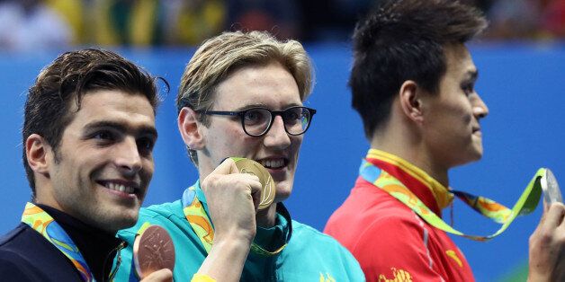 2016 Rio Olympics - Swimming - Victory Ceremony - Men's 400m Freestyle Victory Ceremony - Olympic Aquatics Stadium - Rio de Janeiro, Brazil - 06/08/2016.  Sun Yang (CHN) of China (PRC), Gabriele Detti (ITA) of Italy and Mack Horton (AUS) of Australia pose with their medals.     REUTERS/Stefan Wermuth  FOR EDITORIAL USE ONLY. NOT FOR SALE FOR MARKETING OR ADVERTISING CAMPAIGNS.