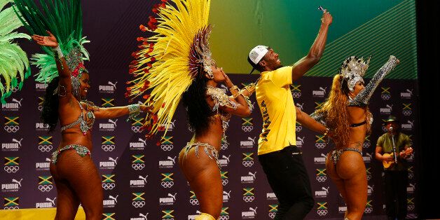 2016 Rio Olympics - Athletics - Rio de Janeiro, Brazil - 08/08/2016. Usain Bolt dances samba at a press conference. REUTERS/Nacho Doce  FOR EDITORIAL USE ONLY. NOT FOR SALE FOR MARKETING OR ADVERTISING CAMPAIGNS