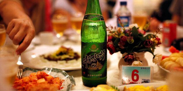 A bottle of beer is seen at a official dinner in Rajin at the Special Economic Zone of Rason City, northeast of Pyongyang August 29, 2011. Building a brewery in North Korea seemed like a good idea to a group of Chinese investors two years ago. The premise was simple: everyone likes beer, even in one of the world's most closed and least understood countries. But the small Chinese-North Korean venture ran aground within months after failing to get final approval from authorities in Pyongyang. Pict