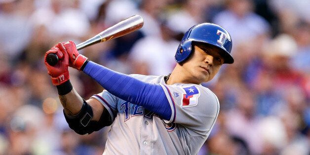 Aug 8, 2016; Denver, CO, USA; Texas Rangers right fielder Shin-Soo Choo (17) in the on-deck circle in the second inning against the Colorado Rockies at Coors Field. Mandatory Credit: Isaiah J. Downing-USA TODAY Sports