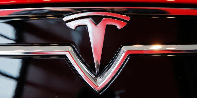 A Tesla logo on a Model S is photographed inside of a Tesla dealership in New York, U.S., April 29, 2016. REUTERS/Lucas Jackson