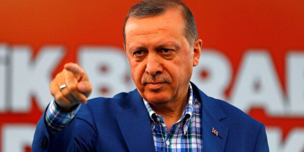 Turkey's President Tayyip Erdogan points at the United Solidarity and Brotherhood rally in Gaziantep, Turkey, August 28, 2016. REUTERS/Umit Bektas