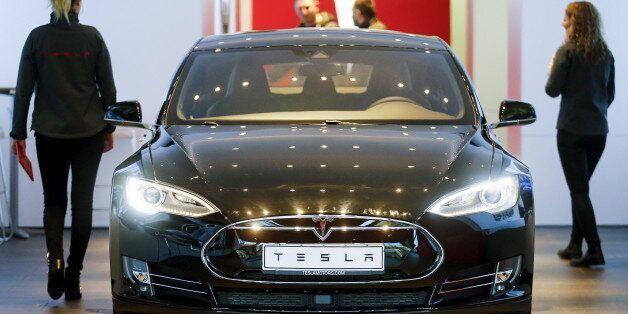 A Tesla car 'Model S' sits in a dealership in Berlin, Germany, November 18, 2015. REUTERS/Hannibal Hanschke