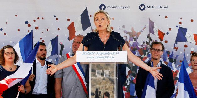 Marine Le Pen, French National Front (FN) political party leader and a member of the European Parliament, delivers a speech as she attends a FN political rally in Brachay, France, September 3, 2016. REUTERS/Gonzalo Fuentes