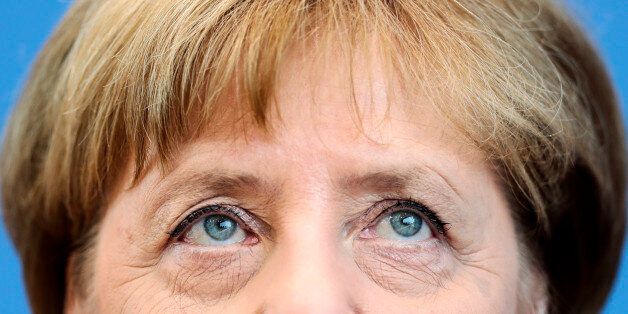 German Chancellor Angela Merkel addresses the media during a news conference in Berlin, Germany, Thursday, July 28, 2016. (AP Photo/Markus Schreiber)